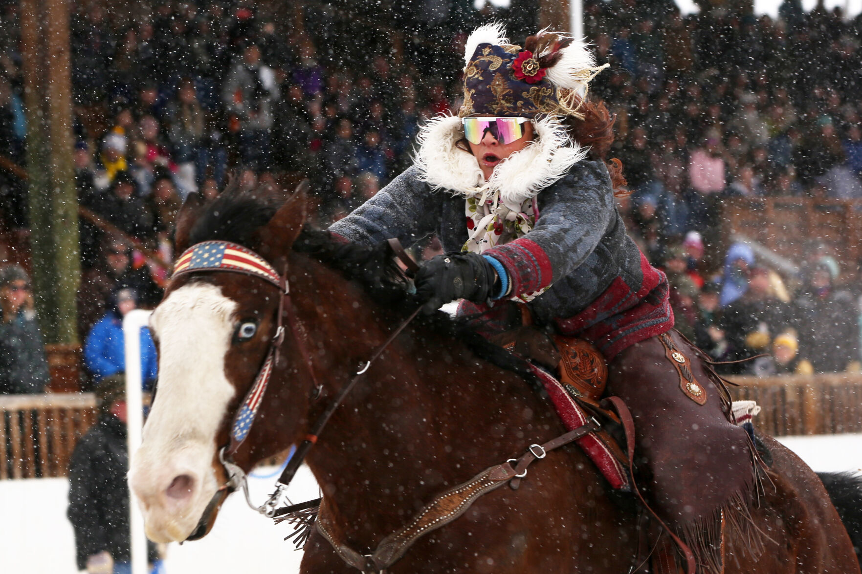 Heidi Gustafson pushes her horse Sid forward as they pull teammate Amelia Rothleutner